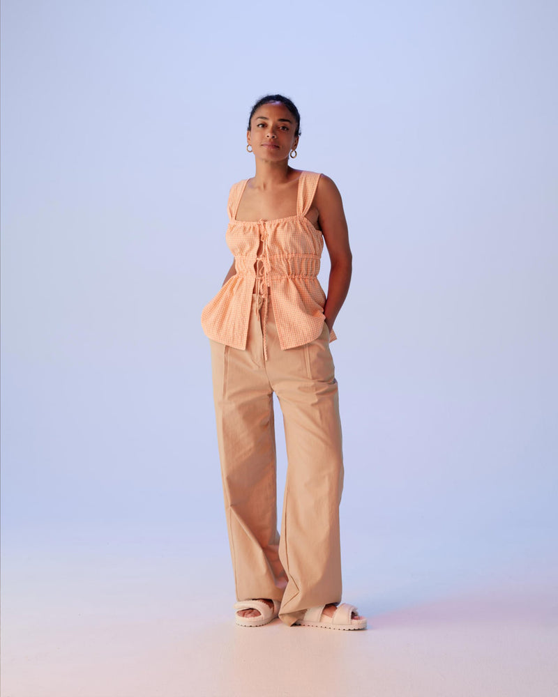 UMA TIE BLOUSE TBF02004 | This piece is second hand and therefore may have visible signs of wear. But rest assured, our team has carefully reviewed this piece to ensure it is fully functional &...