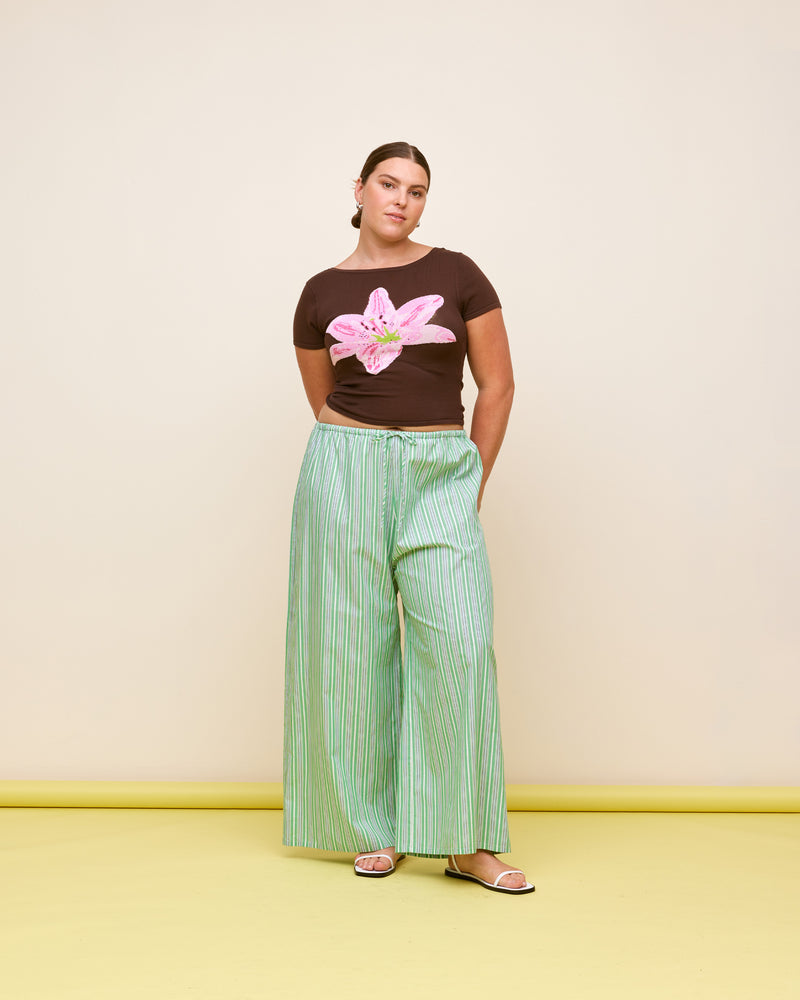 ANDIE COTTON PANT GREEN STRIPE | Palazzo style elastic waist pants with a tie, in a light weight green striped cotton. These pants are high waisted, uncomplicated and classically cool.