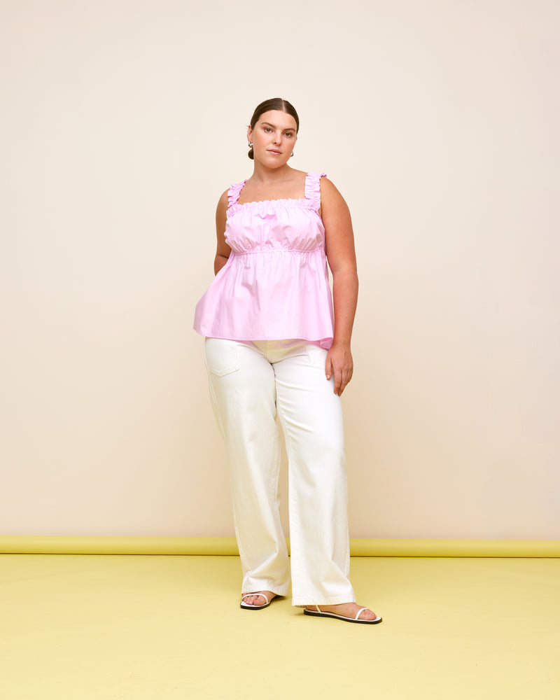 TRULLI TOP PINK | Sleeveless cotton top with a square neckline and shirred bodice and straps. This top falls to a full A-line shape.
