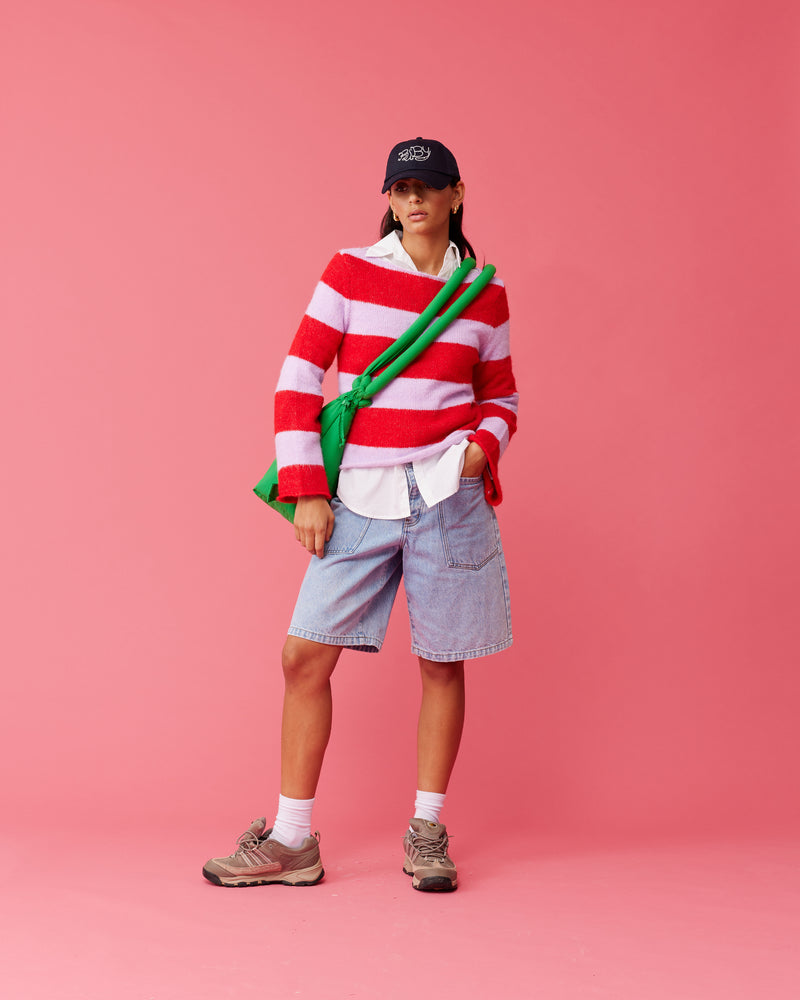 MILO SWEATER PINK CHERRY STRIPE | 90's inspired striped sweater knitted in a soft fluffy wool blend in a pink and cherry stripe. Features flared sleeves and a mid-weight which makes it great for layering as...