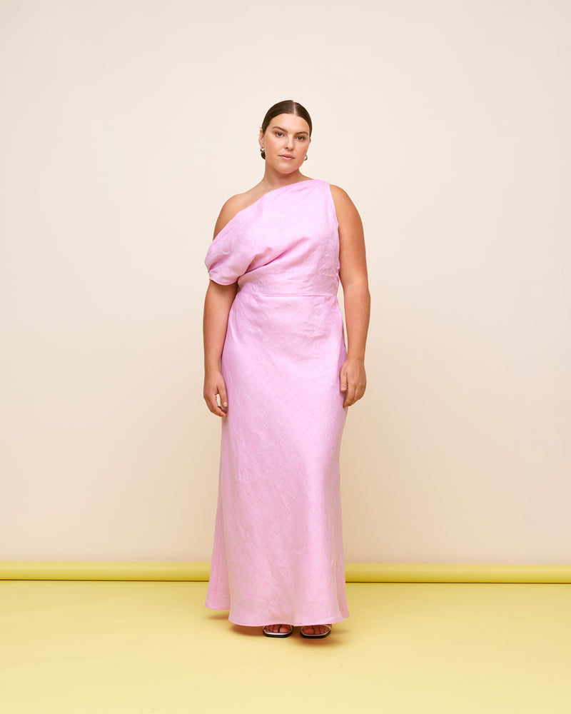 MELON LINEN MAXI DRESS PINK | One shoulder maxi dress designed in a soft pink linen. This dress is fitted at the waist to compliment the draped one-shoulder shape, and falls to a bias cut skirt.