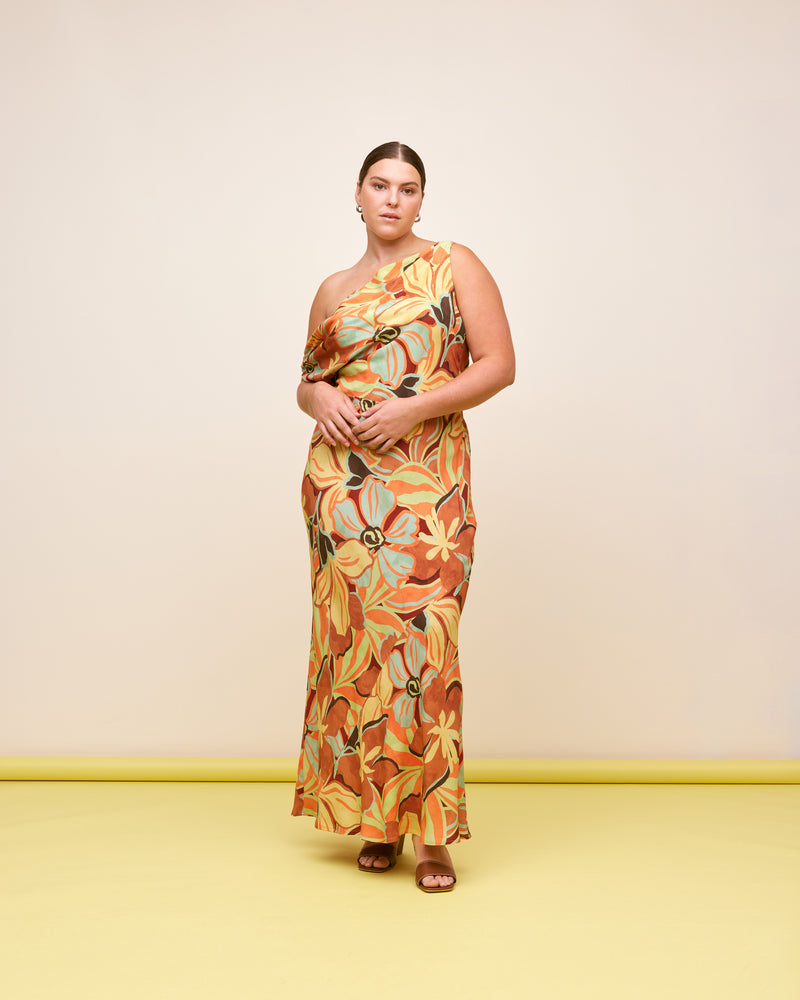 MELON MAXI DRESS MELON FLORAL | Maxi slip dress with a cowl neckline, designed in our vintage-look melon floral crepe. Wear this dress on the shoulder or as a one-shoulder silhouette.