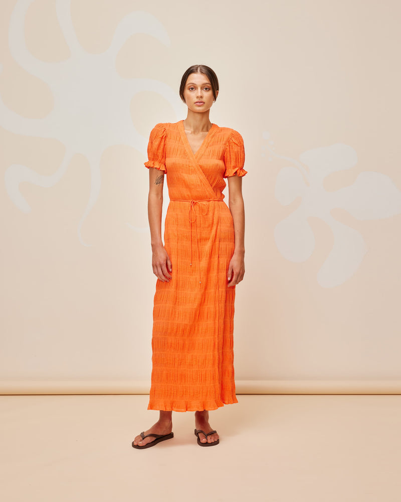 MIRELLA SHORT SLEEVE WRAP DRESS APEROL | Floaty wrap dress with short elasticated ruffle sleeves and an adjustable waist tie in the signature Mirella fabric, a delicate embroidered cotton. Like all wrap dresses this piece is incredibly...