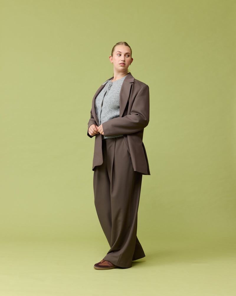 RUE TROUSER DONKEY | Straight-leg mid-waist suit trouser with a flat waistband and belt loops. These pants are versatile in that they can be worn casual with a baby tee, or formal with the...