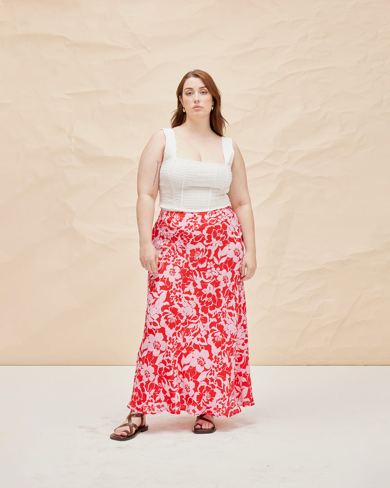 BOBBI SILK SKIRT CHERRY FLORAL | Bias cut straight skirt designed in our vibrant cherry floral print. Features a tie at the waistband which can be styled how you like.