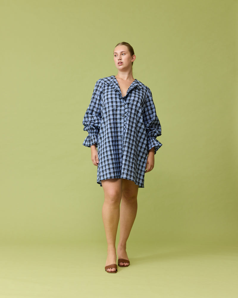 SANDLER LONG SLEEVE MINI DRESS BLUE TARTAN | Button down long sleeve shirt dress with a feature ruffled collar and ruffles down the placket. Feature side pockets and an A-line silhouette.