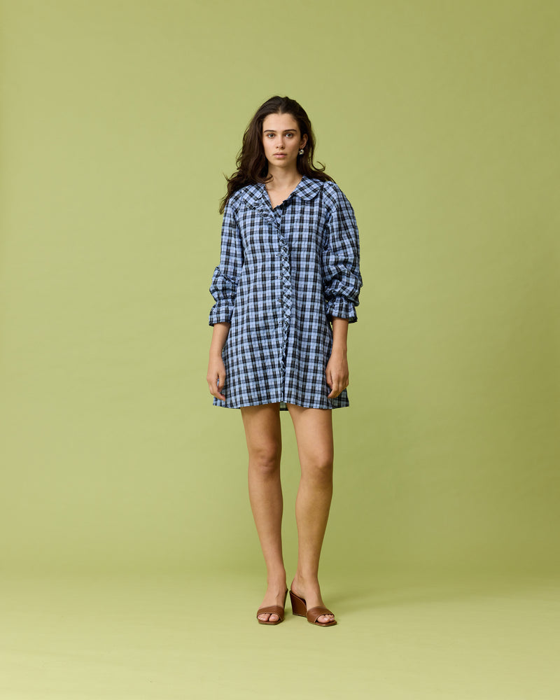 SANDLER LONG SLEEVE MINI DRESS BLUE TARTAN | Button down long sleeve shirt dress with a feature ruffled collar and ruffles down the placket. Feature side pockets and an A-line silhouette.