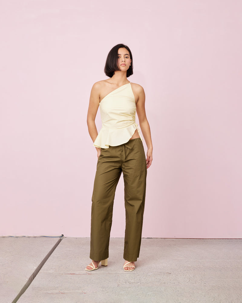 SKIPPER PANT KHAKI | elaxed fit, low-waist trouser with a drawstring and a zip fly closure. Pocket detailing on back. With a sporty style and modern design, these pants make the easiest addition to your...