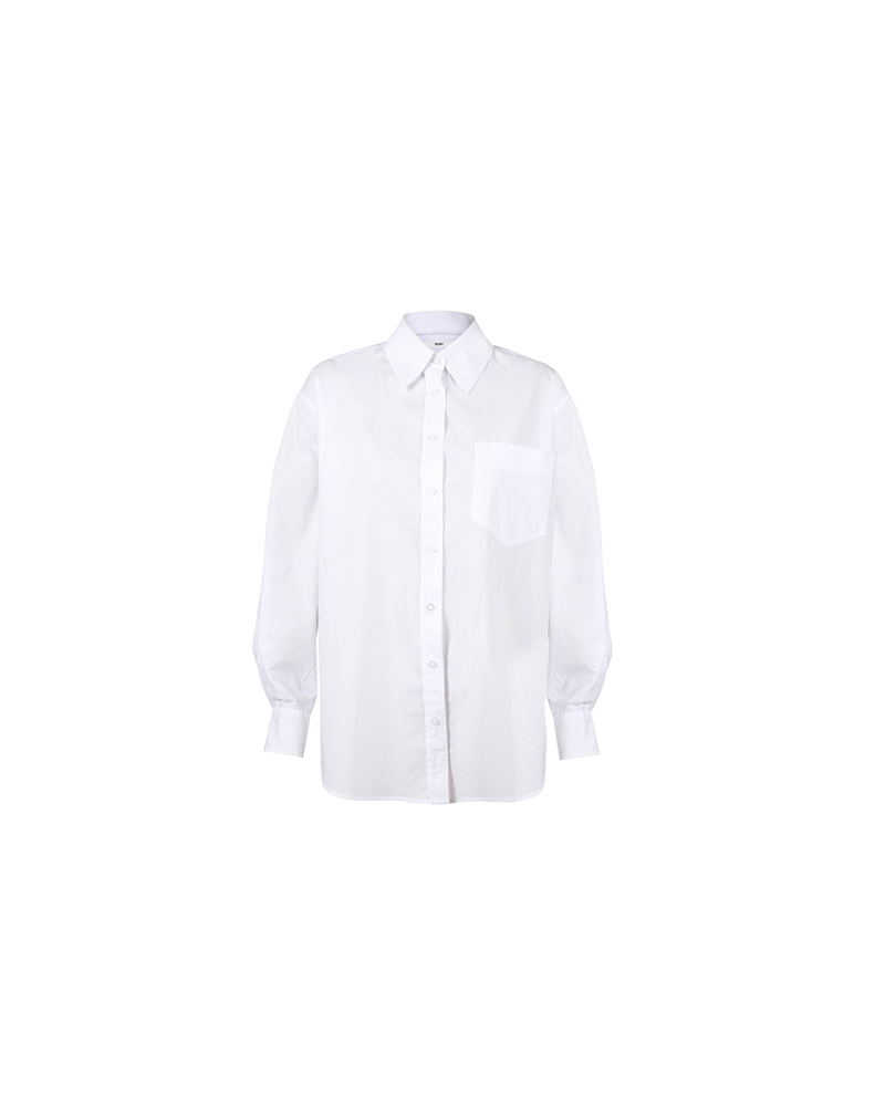 ALLORA COTTON SHIRT WHITE | Oversized crisp white shirt with classic shirt detailing and a large front pocket, now in an organic cotton. This piece is a timeless wardrobe staple that you will wear for...