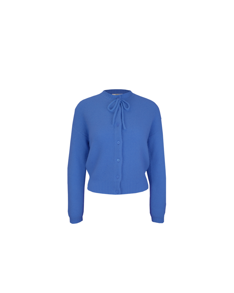 ANNIE CARDIGAN COBALT | Crew neck cardigan with a button-down placket, designed in a cosy alpaca wool blend. This cardigan comes with a detachable bow-tie, to style on the cardigan through the buttonhole, in...
