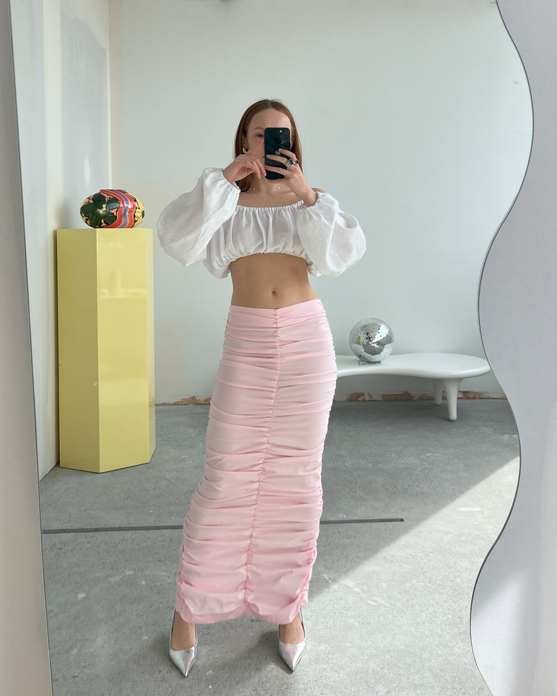 RSR SAMPLE 3458 ARIEL MIDI SKIRT | RUBY Sample Ariel Midi Skirt in pink. Size 8. One available. Danni is 163cm tall and usually wears a size 6-8. She measures: BUST: 81cm, WAIST: 67cm, HIP: 93cm. 