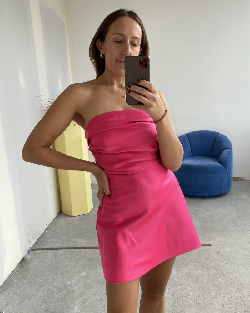 RSR SAMPLE 3370 CHER MINIDRESS | RUBY Sample Cher Minidress in super pink. Size 8. One available. Deanna usually wears a size 8. Please note: This dress has a mark on the front as shown in the...