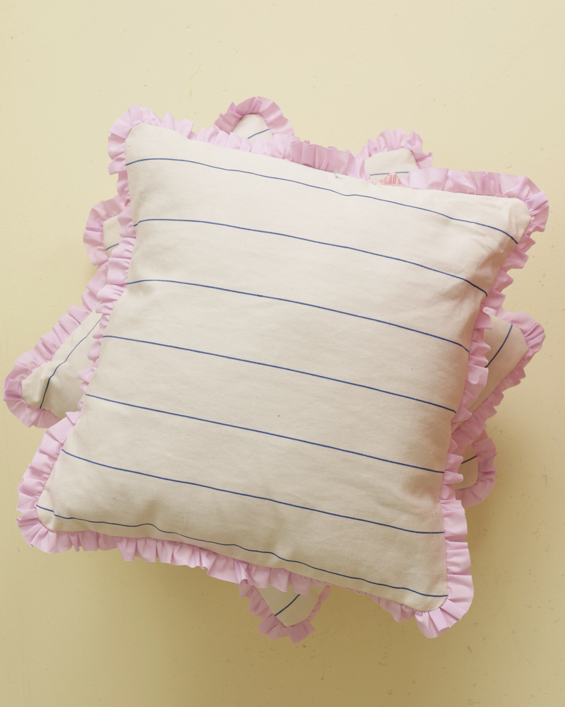 LIL RUFFLE RECYCLED CUSHION FINE STRIPE | Our very own RUBY cushions have arrived! Medium-sized decor cushion designed in a cream and navy stripe, with a feature lilac ruffle around the edge. With its neutral colouring and pop...
