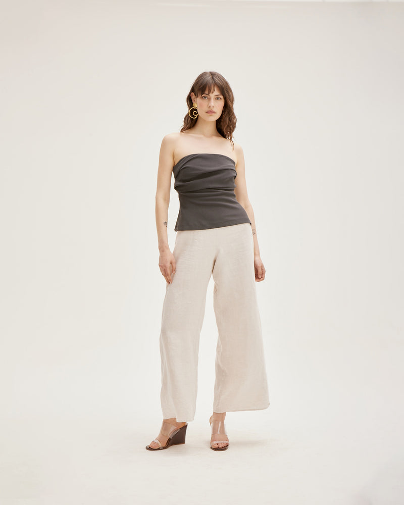 MARLEY LINEN PANT PETITE NATURAL | Highwaisted, wide leg linen pants that sit above the belly button, these are sure to be on high rotation in your trans-seasonal wardrobe. Sitting flat at the waistband, they flare...