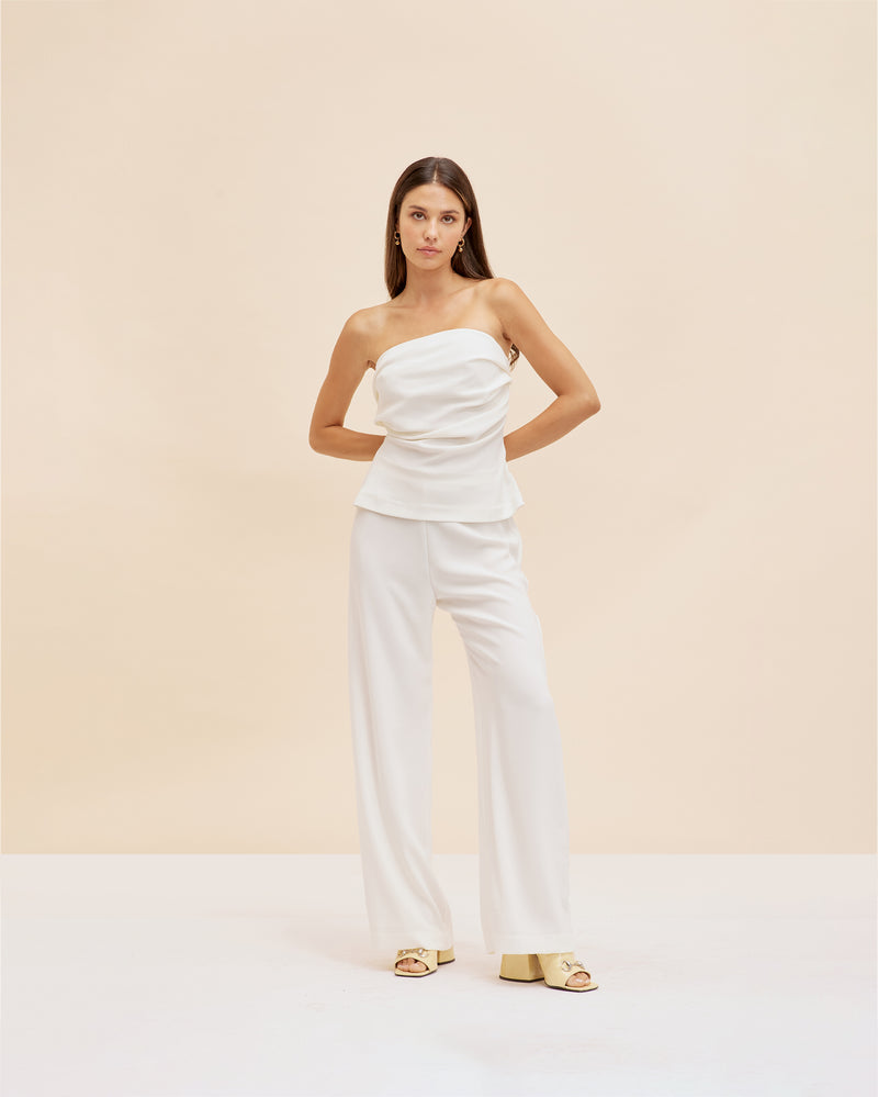 FIREBIRD PANT PETITE CREAM | Classic highwaisted pant with a straight leg silhouette, in a petite length. An effortless and versatile piece perfect for work and beyond. This colourway is lined for coverage.