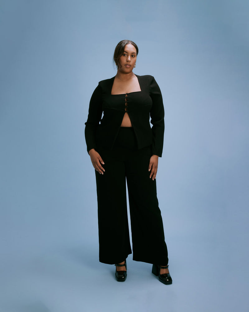 FIREBIRD PANT TALL BLACK | Classic highwaisted pant with a straight leg silhouette. An effortless and versatile piece perfect for work and beyond. This length is designed for our tall Rubettes.