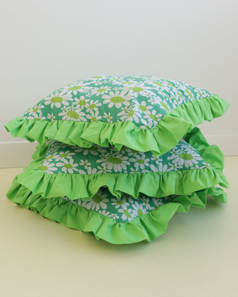 RUFFLE RECYCLED CUSHION GREEN | Our very own RUBY cushions have arrived! Medium size decor cushion designed in a green daisy print with a feature green ruffle. The perfect way to bring some colour into...
