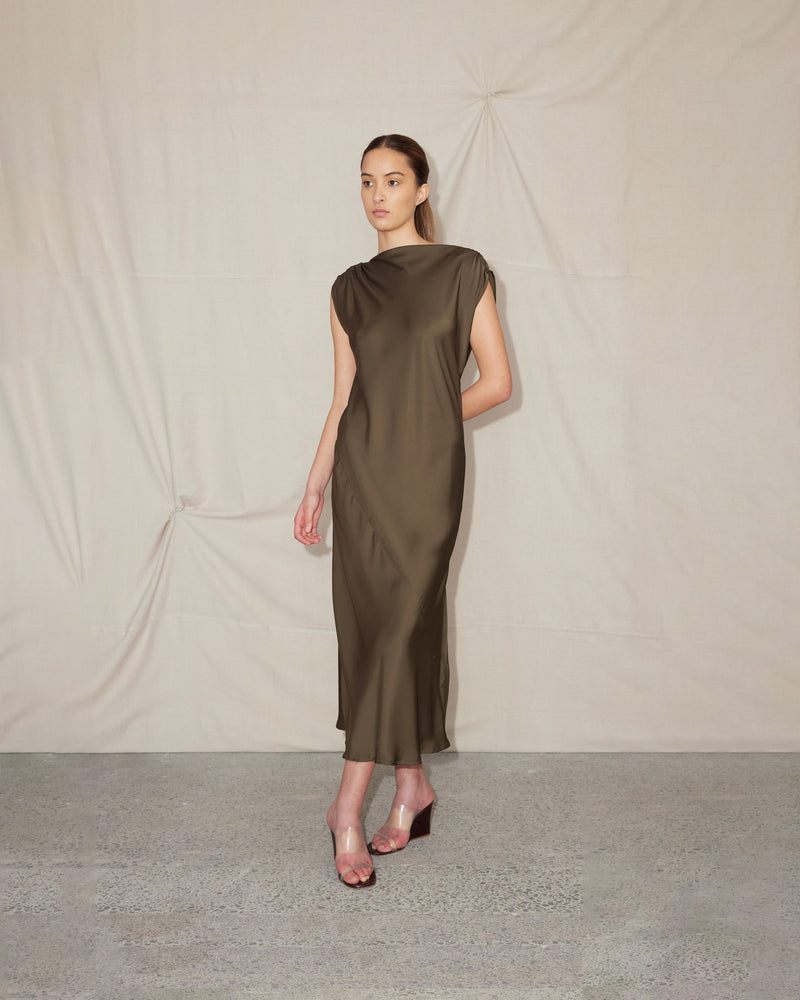 CURTIS MIDI DRESS JETTA GREEN | Bias cut cap sleeve midi dress crafted in a lush 'jetta' green satin. This piece has ruched detail at the shoulder, a tie to cinch in the waist and a...