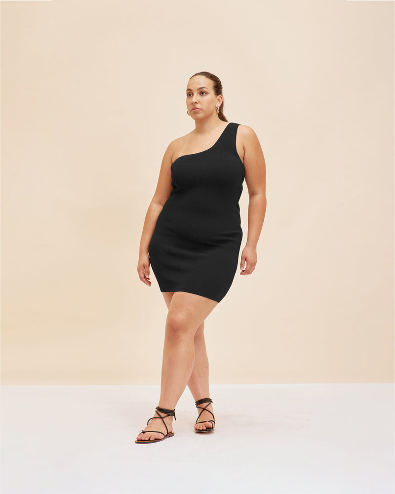 LOTUS MINI DRESS BLACK | Asymmetrical one-shouldered mini dress with ribbing detail throughout. A staple basic in any Rubette's wardrobe, crafted in classic black.