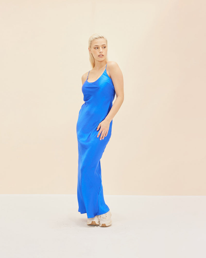 LOGAN SILK SLIP SAPPHIRE | Bias cut slip cut in a rich sapphire coloured silk with a lustrous sheen. Designed to highlight your natural figure, this piece is effortlessly elegant.
