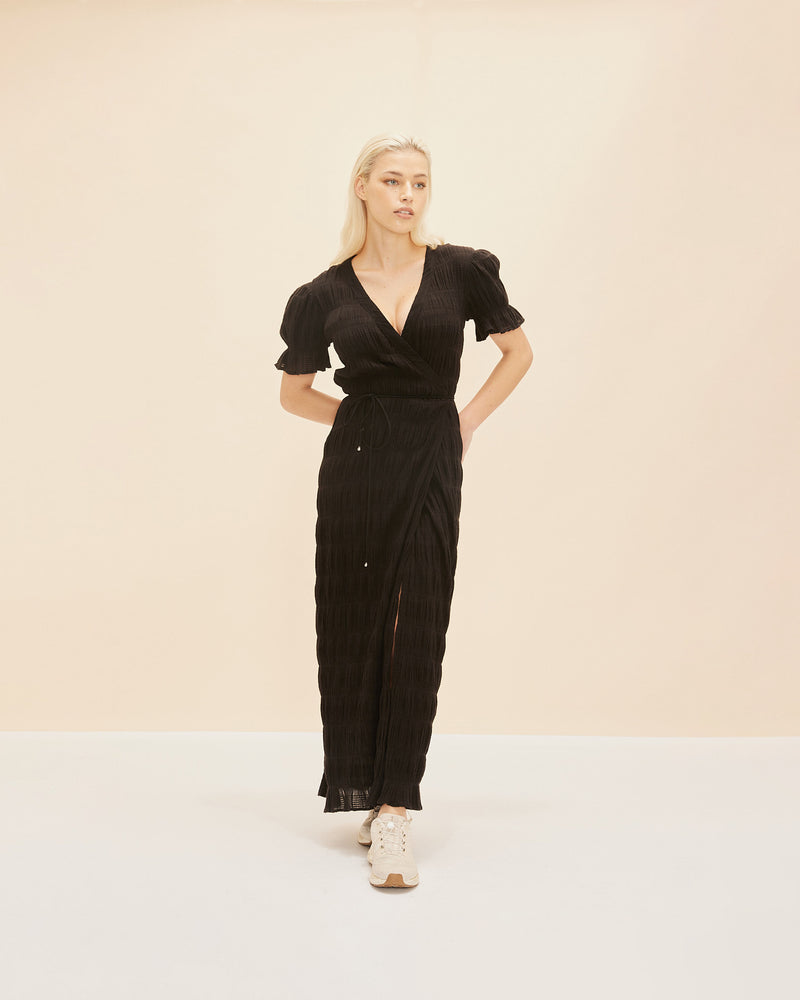 MIRELLA SHORT SLEEVE WRAP DRESS BLACK | Floaty wrap dress with short elasticated ruffle sleeves and an adjustable waist tie in the signature Mirella fabric, a delicate embroidered cotton. Like all wrap dresses this piece is incredibly versatile...