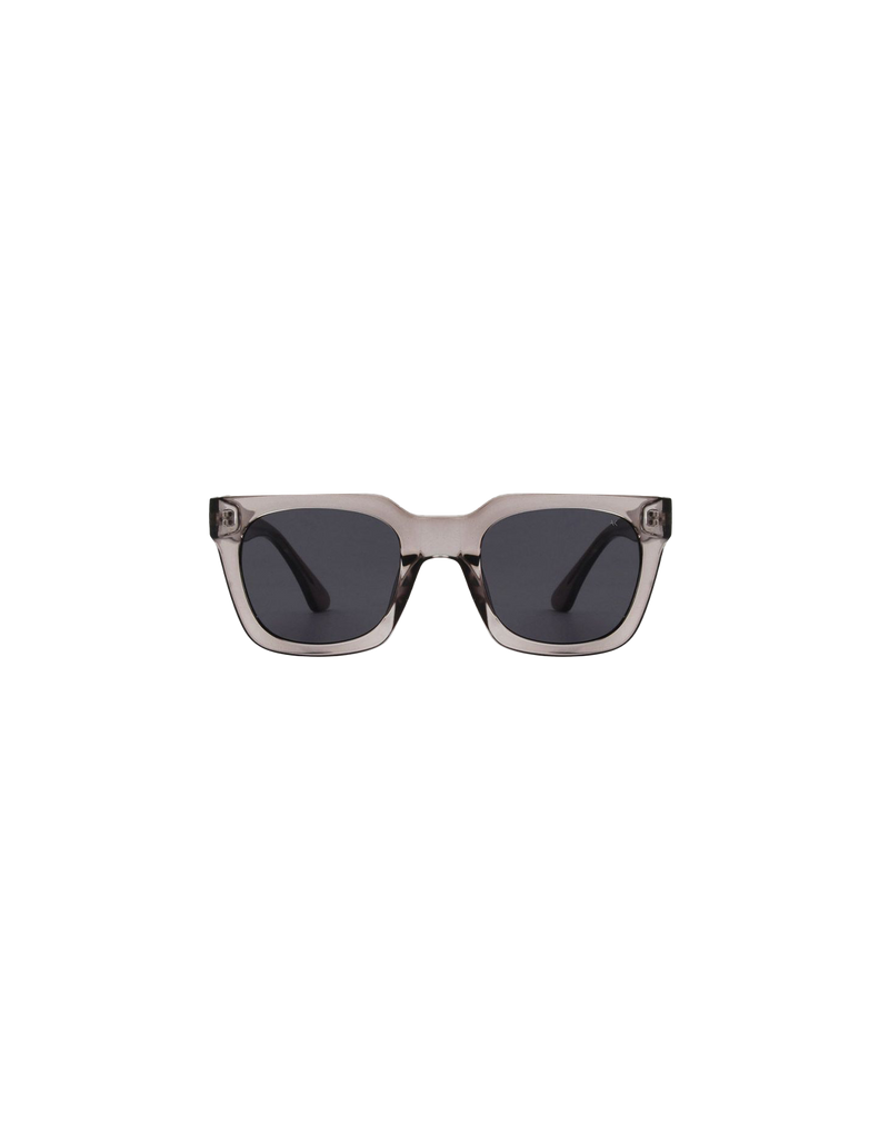 NANCY SUNGLASS GREY TRANSPARENT | A modern and timeless sunglass with a wide, square frame and oversized glass. Features grey transparent coloured frames and clear tinted lenses.
