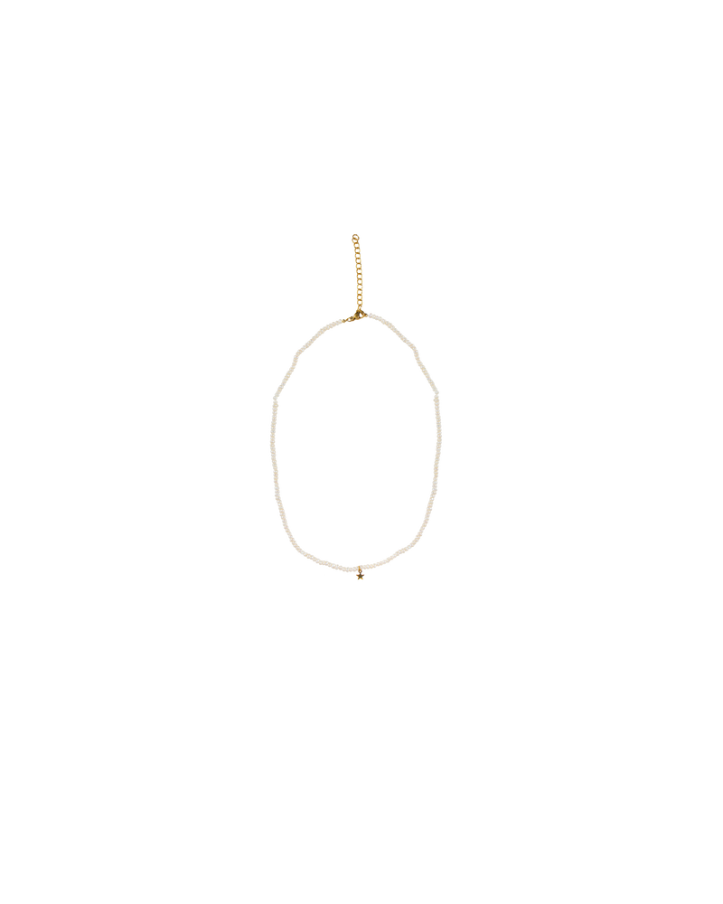 PEARL STAR NECKLACE GOLD/PEARL | The Small Pearl Necklace is a delicate style necklace. It features small pearl beads with three gold star charms evenly spaced throughout.