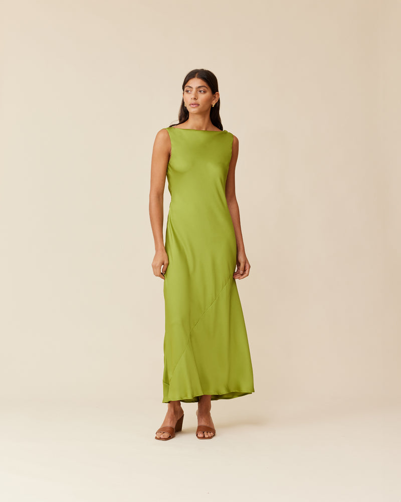 FIREBIRD COWL GOWN PEA GREEN | Sleeveless dress crafted in luxe pea green satin. Features a minimal silhouette with a cowl back detail and a tie to cinch in the waist.