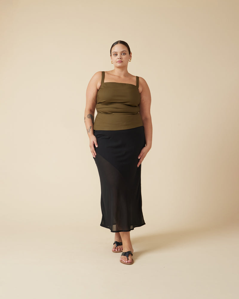 MAISIE SKIRT BLACK | Cowl waist maxi skirt design in a floaty black chiffon. Features an asymmetrical lining, which gives the soft chiffon fabric some depth and elevates this staple black maxi skirt.
