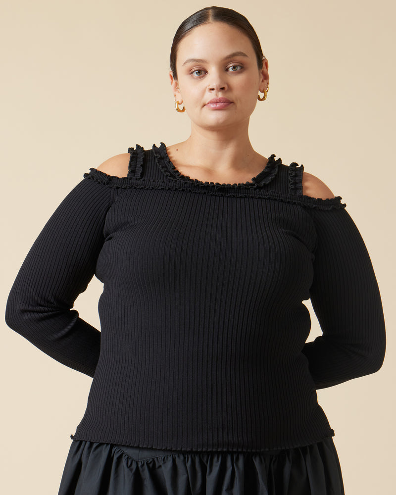 LOLLO LONG SLEEVE BLACK | This off-the-shoulder long sleeve top features a delicate ruffle along the neckline, complementing its ribbed texture throughout. Pairs perfectly with the Lollo Tank.