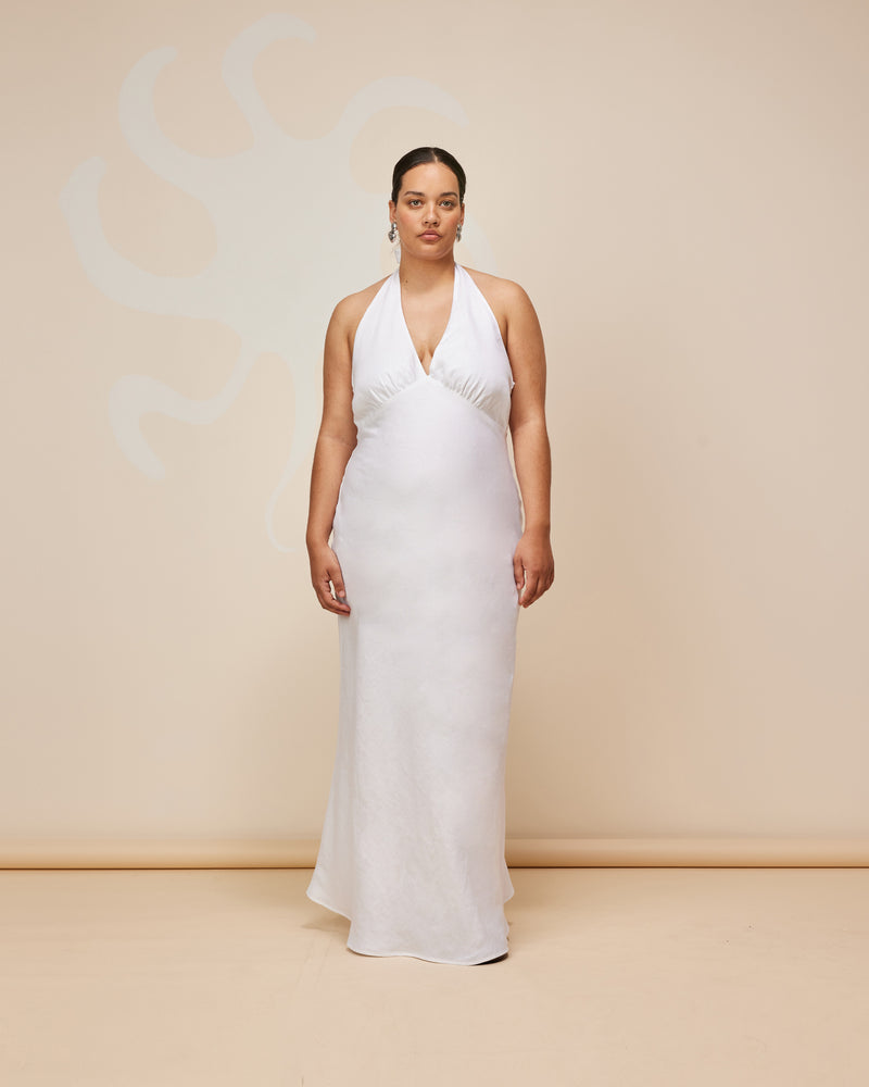 AVA LINEN HALTER DRESS WHITE | Bias cut maxi halter dress cut in a crisp white linen. It's all in the details with this one, a long wide tie, bust shaping and backless shape make this...