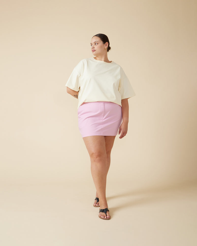 RUE MINI SKIRT MACARON | Suit style mini skirt designed in a mid-weight macaron pink fabric. Features a mid-rise waist with belt loops across the waistband and side 2 pockets to emphasise the suiting vibe.