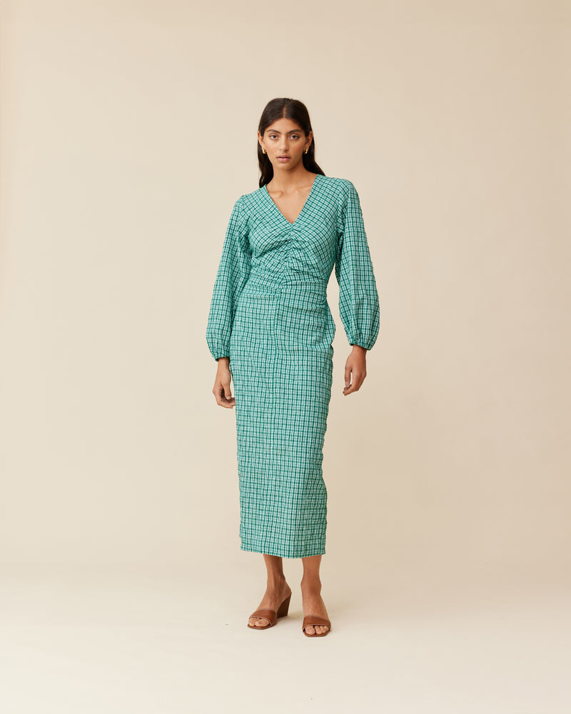 CANARY MIDI DRESS GREEN AQUA CHECK | Long sleeve midi dress with a V-neck designed in an aqua check. This dress features a gathered seam down the centre front, that creates ruching around the body.