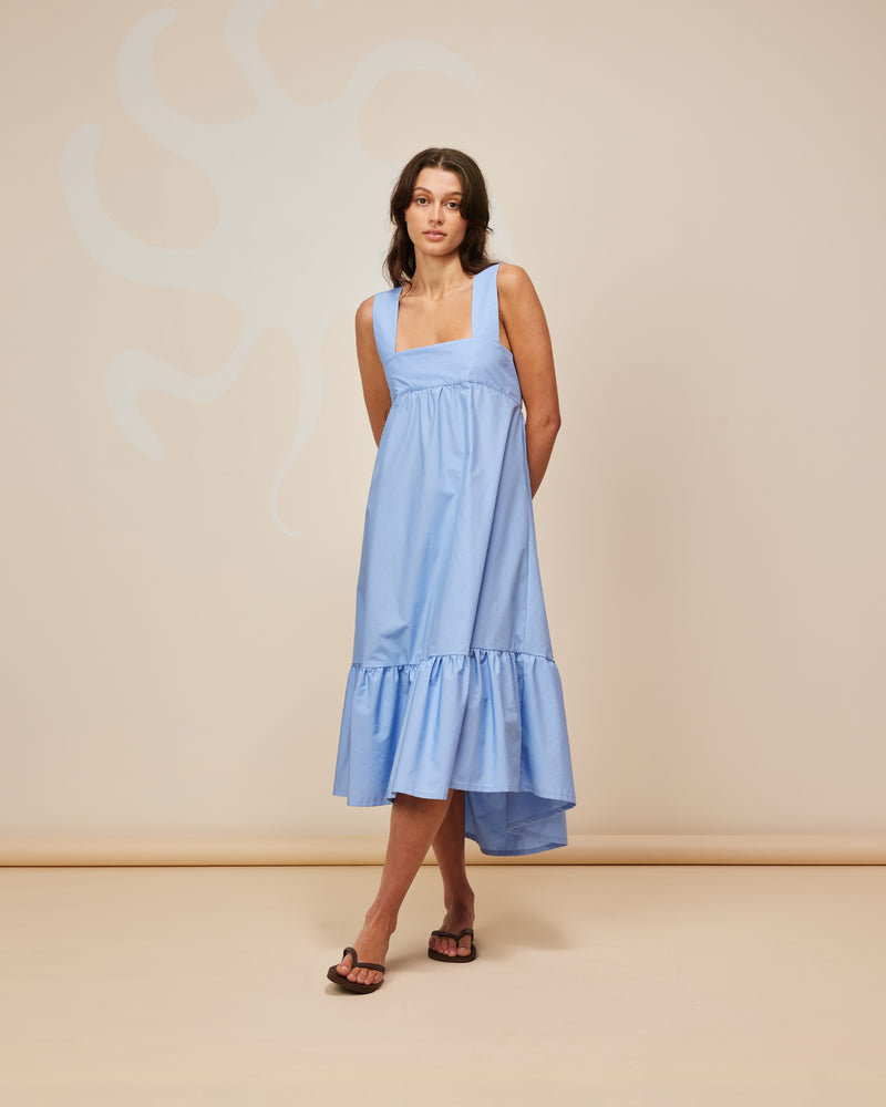MARGIE TIE-BACK DRESS CORNFLOWER | Cotton maxi dress with a square band bust. The skirt falls into a ruffled tier hem with an exposed back and bow tie closure.