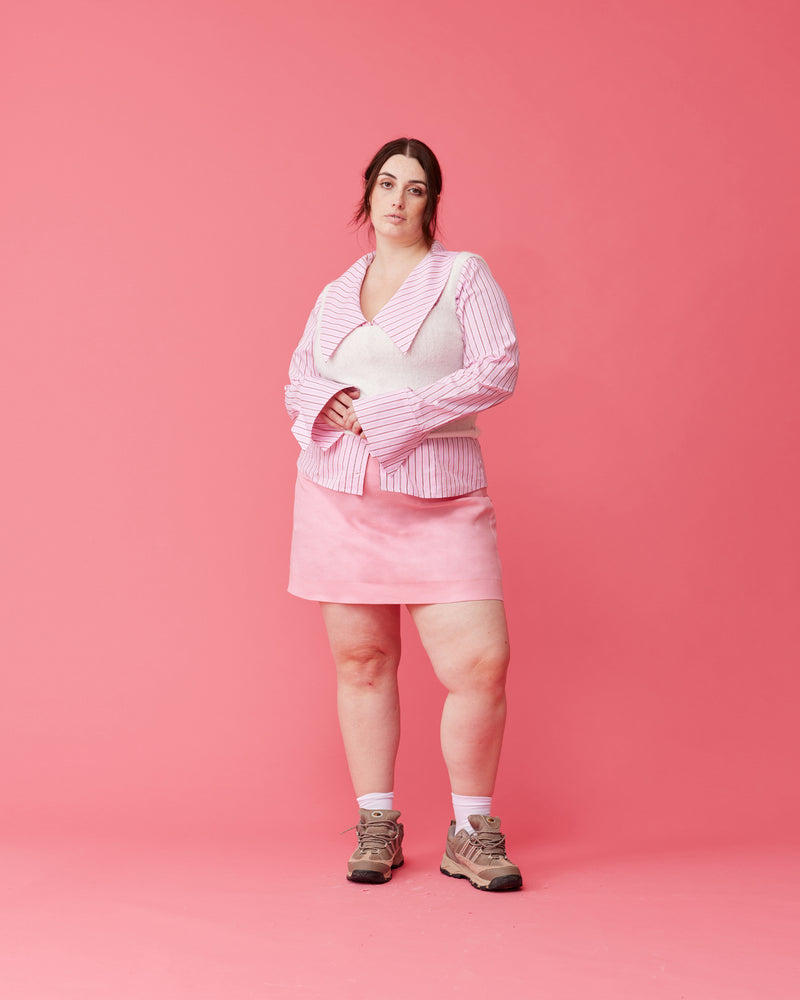 MORGAN LINEN MINISKIRT  PINK | A-line shape miniskirt designed in a crisp pink mid-weight linen. This skirt is the perfect wardrobe staple with a tee or sweater.