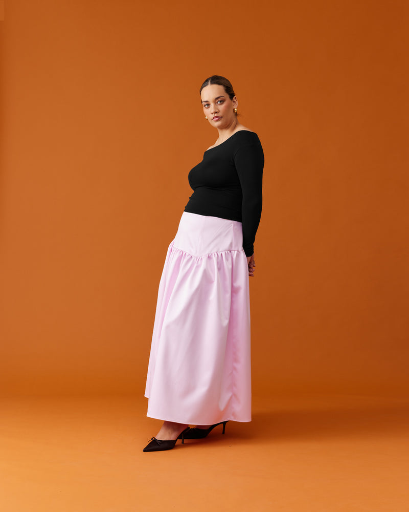 TRULLI SATIN SKIRT SOFT PINK | Floaty basque style maxi skirt imagined in a soft pink satin. This skirt features a bodice-style waistline, that falls to a full, wide skirt.
