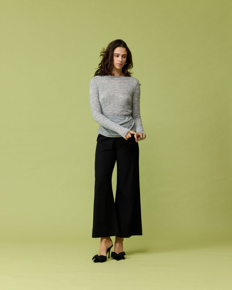 REESE PANT BLACK | Wide leg pant designed in a soft black fabric. These pants fit comfortably around the waist and fall into a relaxed wide leg shape.
