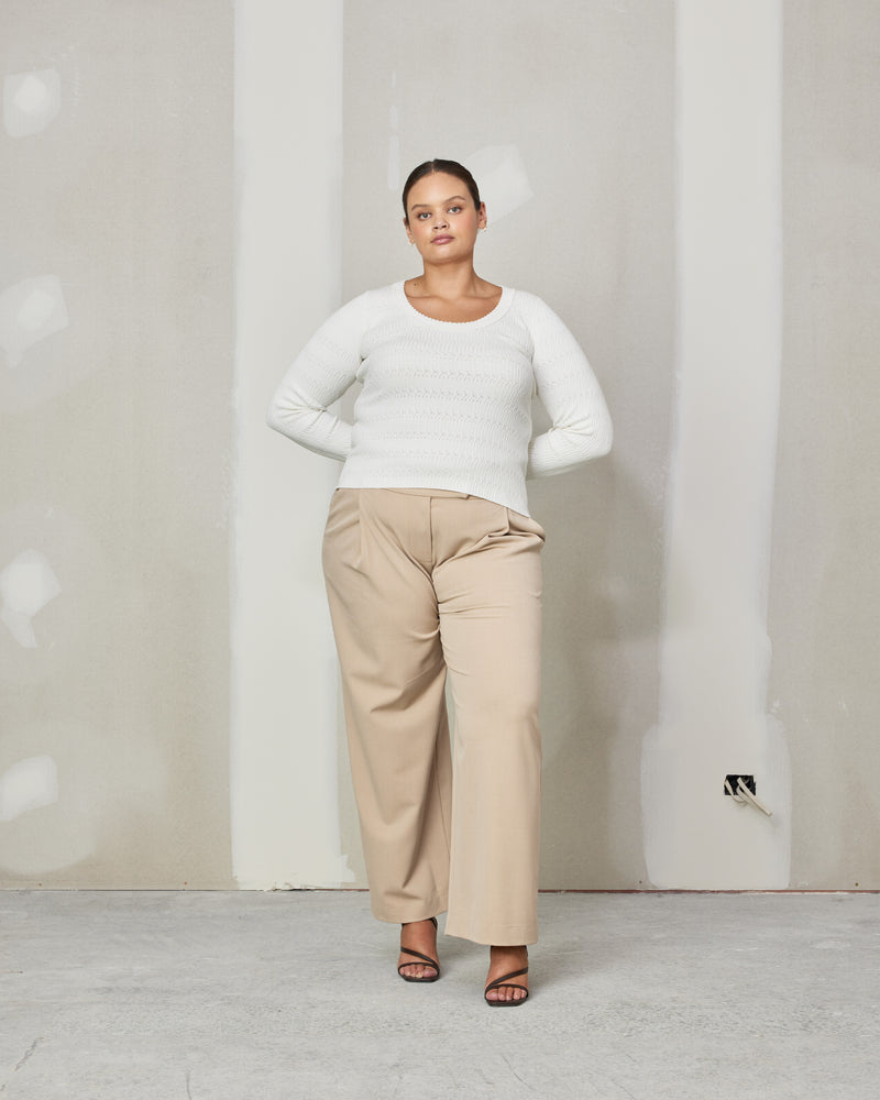 VANYA LONG SLEEVE CREAM | 
Braided knit long sleeve designed in a soft mid-weight knit with a plush hand-feel. This top has a neckline rib detail that adds to the luxe feel of the piece.