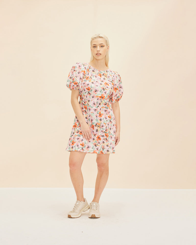 ALLEGRA LINEN MINIDRESS PANSY FLORAL | Bias cut linen mini dress with puff sleeves and a keyhole with tie closure at the back neck designed in our RUBY pansy floral. The bias silhouette of this dress...