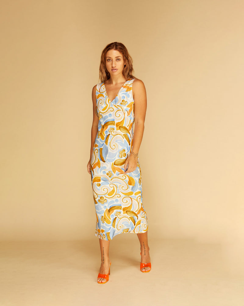 DYLAN SLIP CERAMIC | Bias cut midi dress in a RUBY exclusive ceramic print. Wide straps and a panelled V-neck front and back give this dress a vintage shape.