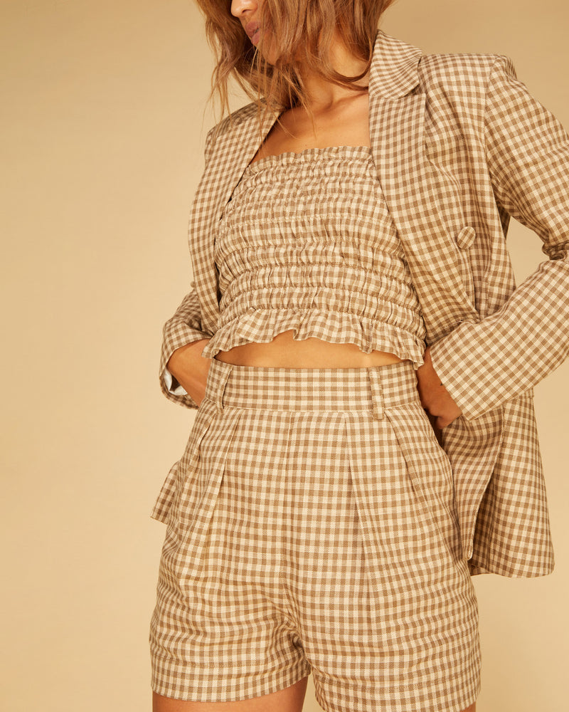 HUTTON BLAZER BROWN GINGHAM | Oversized blazer with front pockets, cut from a neutral gingham. Designed in a relaxed double-breasted shape with self covered buttons, meaning this piece can be styled open or done up...