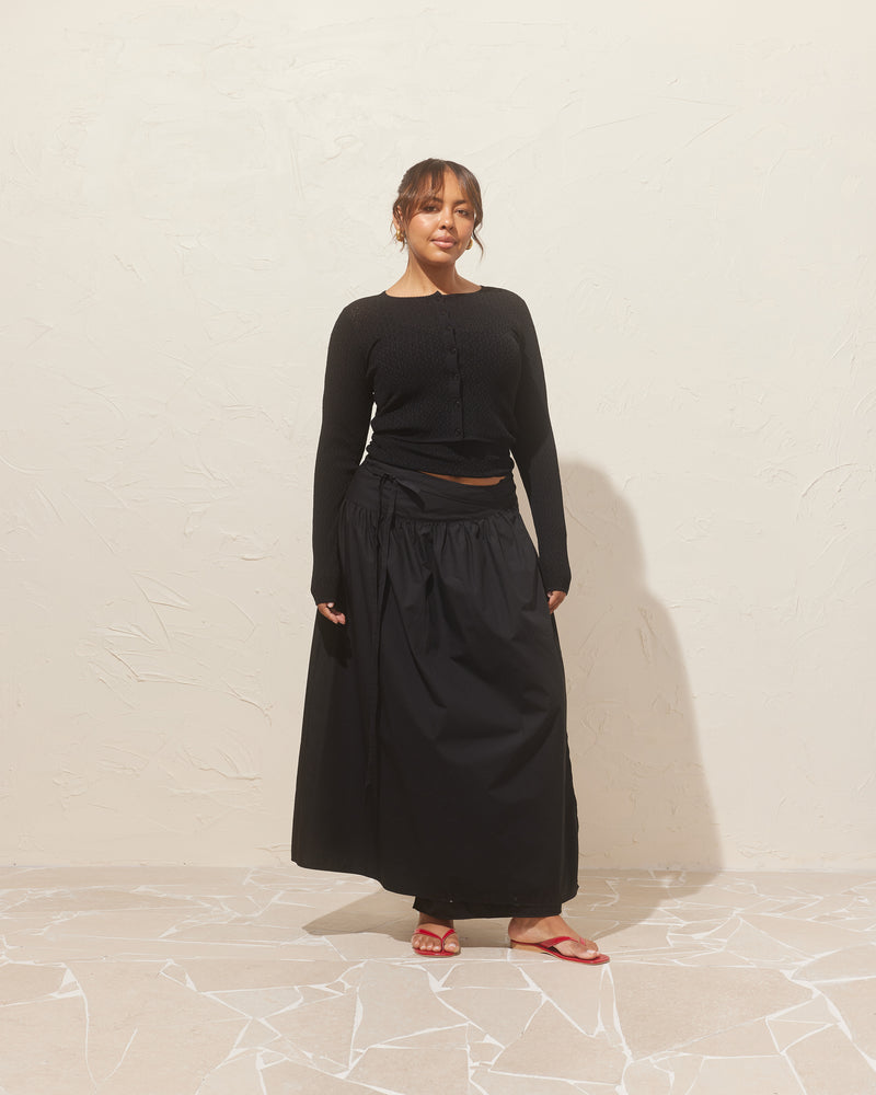 RODEO MAXI SKIRT BLACK | Ballerina-inspired wrap maxi skirt designed in a black organic cotton. This skirt can be styled on its own or, you can even try tying the wrap as a bodice dress.