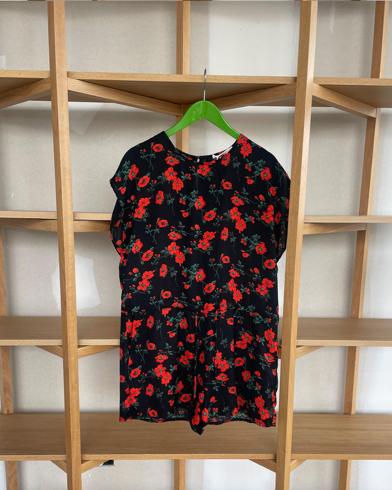 FLORAL PLAYSUIT  TBF01955 | This piece is second hand and therefore may have visible signs of wear. But rest assured, our team has carefully reviewed this piece to ensure it is fully functional &...