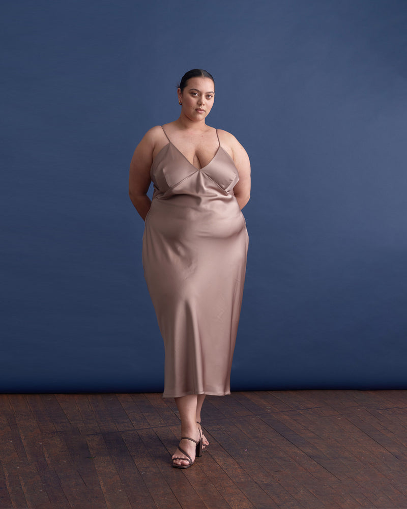 WEIRDER SLIP TIRAMISU | Iconic bias cut slip dress with plunging neckline. A wardrobe staple in heavy weight double satin that is lush to wear, in a rich tiramisu shade.