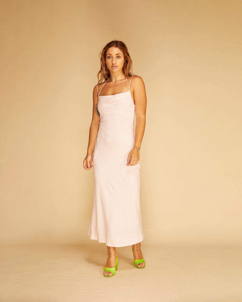 JORDAN LINEN SLIP BLUSH | Bias cut linen slip with a soft cowl neck, double strap detail and side split. Imagined in a soft blush linen that adds a relaxed element to this classic shape.