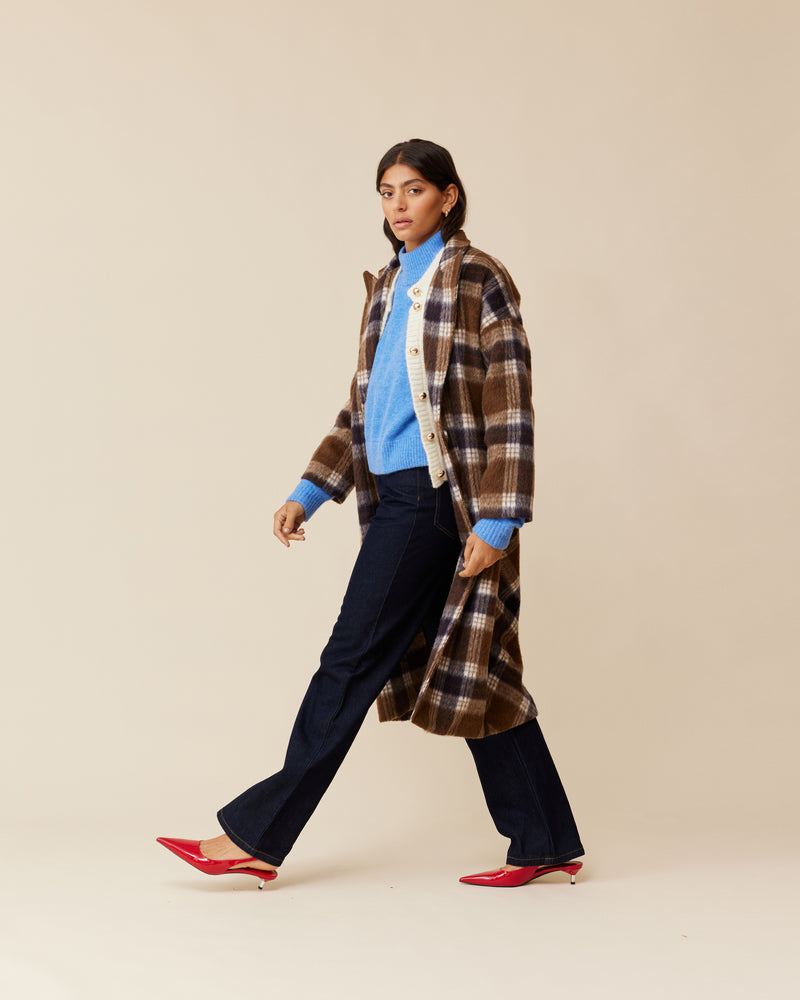 ROONEY COAT BROWN CHECK | Our sought-after Rooney Coat is back! Features an oversized drop shoulder with a wide notched lapel and full-length sleeves, in a neutral brown checked wool blend.  This coat has a...