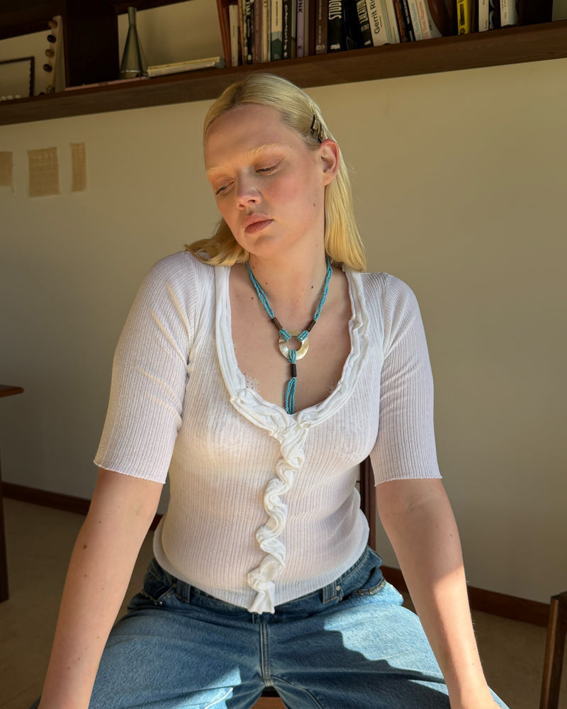 CHELSEA KNIT TOP WHITE | An update to our Chelsea Crinkle Top, designed in a knitted cotton blend with 3/4 sleeves and ruffle detailing. This top is the perfect elevated staple for any occasion, from office-wear to a night out. Pairs perfectly with your favourite denim,...