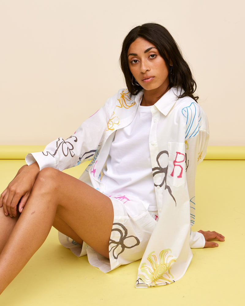 RYDER SHIRT RYDER PRINT | An ode to our much-loved collab with artist Ryder Jones. Longsleeve cotton shirt with printed Resort 23 graphics. The perfect summer layering piece. Make it a set with the Ryder...
