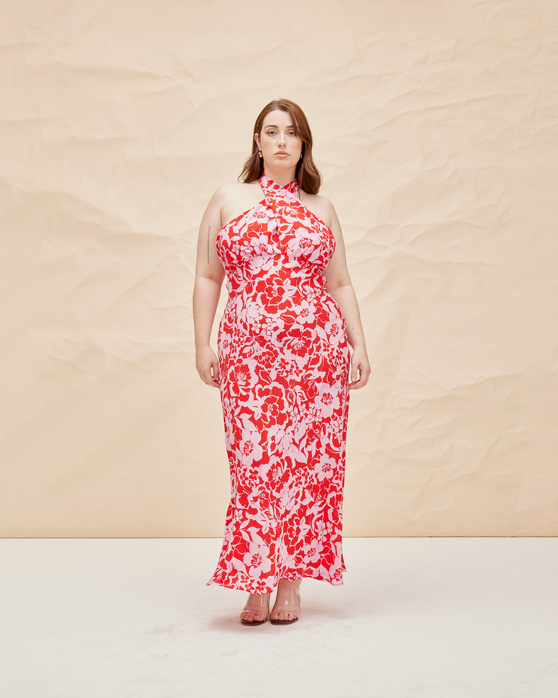 BOBBI SILK HALTER DRESS CHERRY FLORAL | Bias cut silk halter maxi dress designed in our vibrant cherry floral print. The halter ties are adjustable and can be styled in many ways.