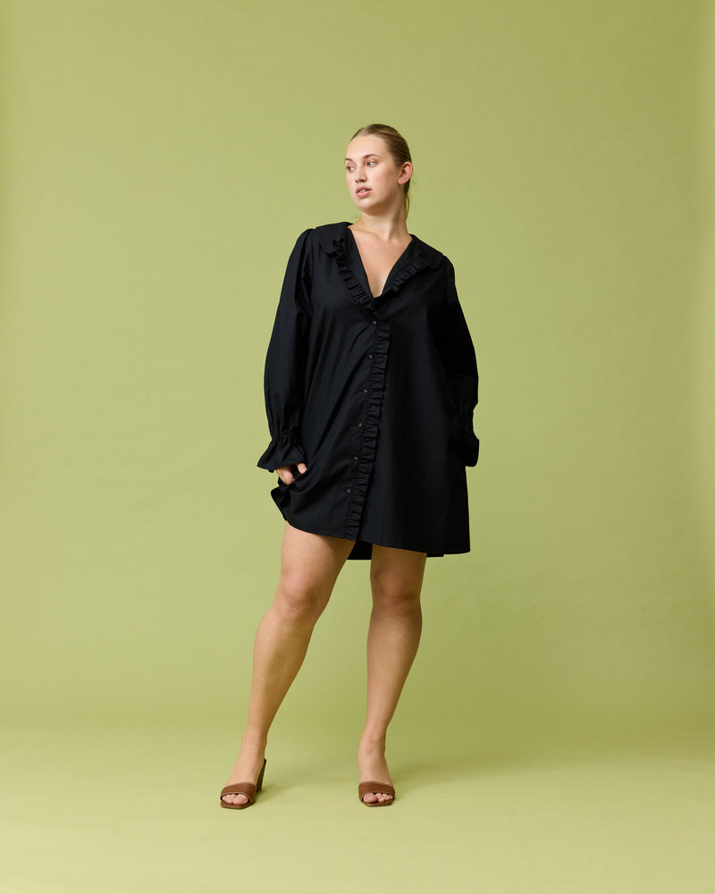 SANDLER LONG SLEEVE MINI DRESS BLACK | Button down long sleeve shirt dress with a feature ruffled collar and ruffles down the placket. Feature side pockets and an A-line silhouette.